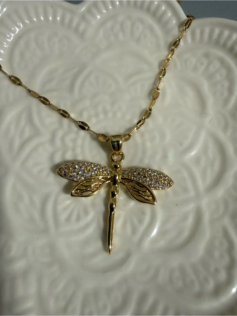 gold-plated dragonfly necklace featuring a pendant adorned with cubic zirconia
